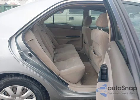 2005 Toyota Camry Le z USA, uszkodzony, nr VIN JTDBE32K153037428